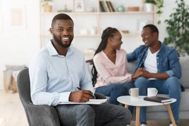 Successful-couple-therapy-and smiling Counselor